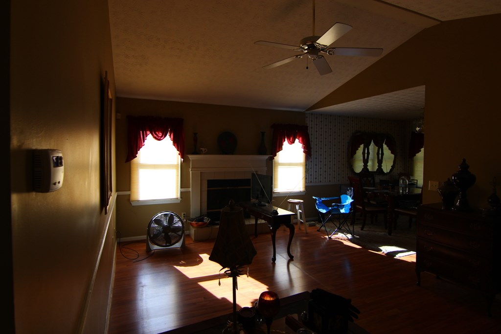 4379 Reesewood Court Columbus, GA 31907 - Photo 5 of 12 a living room with furniture and a fireplace