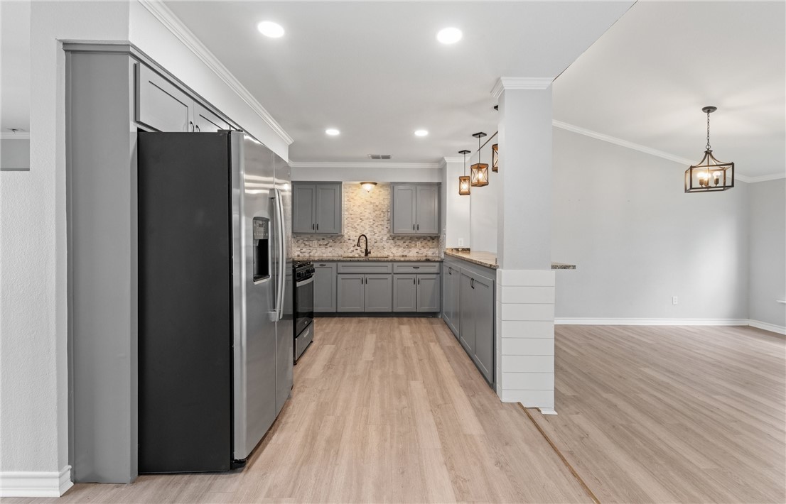 1333 Prince Drive Corpus Christi, TX 78412 - Photo 5 of 20 a view of a kitchen from the hallway