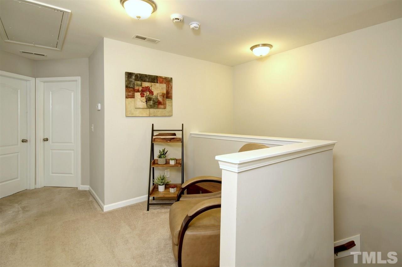 927 Ileagnes Road Raleigh, NC 27603 - Photo 11 of 26 a view of a storage and utility room with washer and dryer