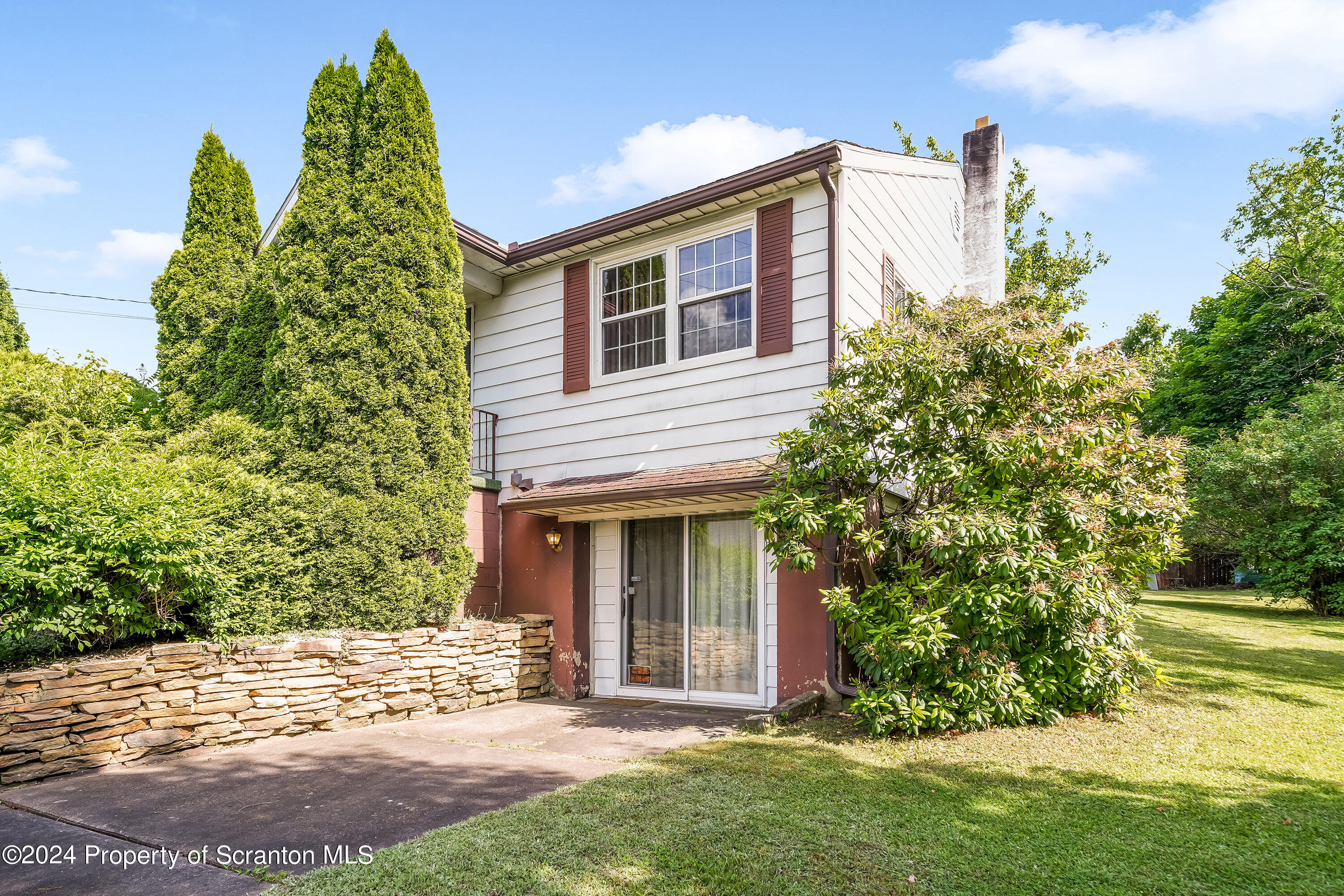 254 Hoover Street Old Forge, PA 18518 - Photo 4 of 27 front view of a house with a yard