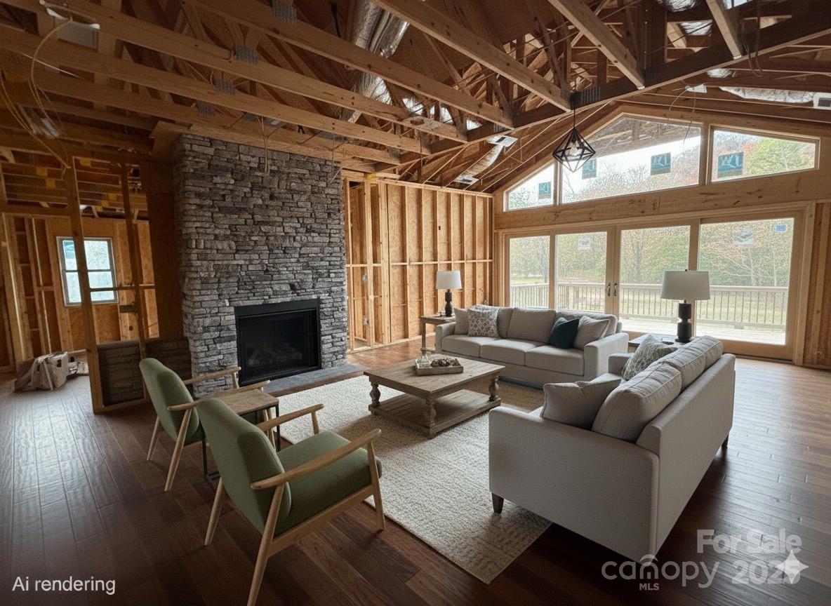 864 Matho Trace Lake Lure, NC 28746 - Photo 5 of 47 a living room with furniture a fireplace and a table