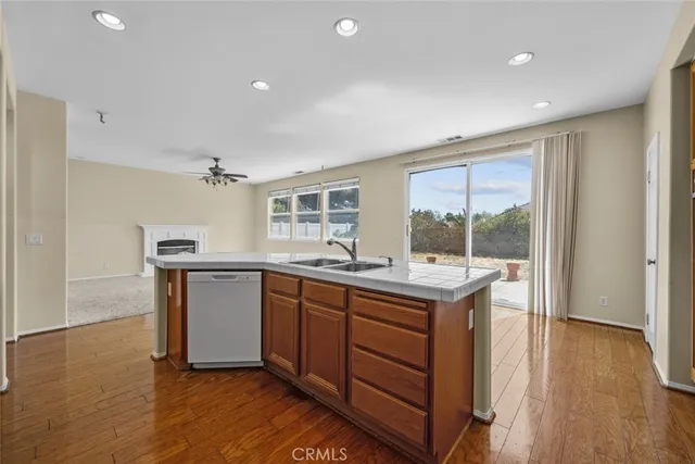 a kitchen with sink and cabinets