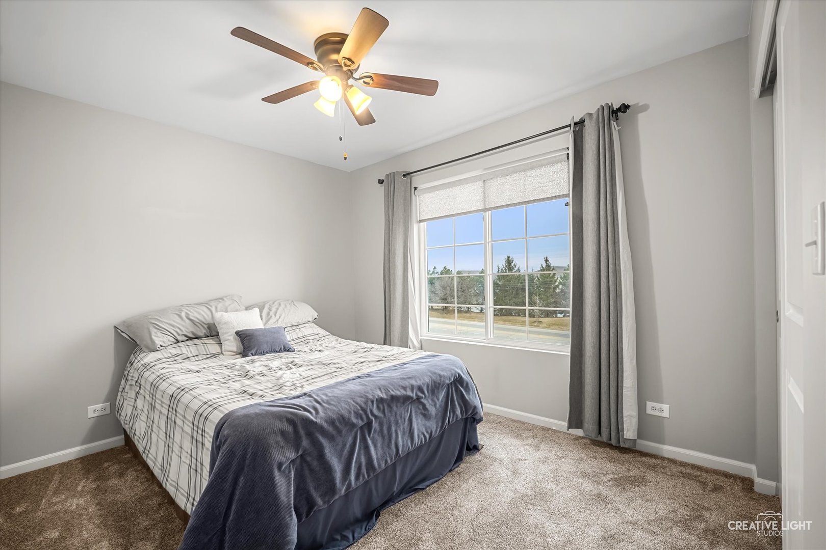 2352 Alison Avenue Pingree Grove, IL 60140 - Photo 14 of 17 a bedroom with a large bed and a large window