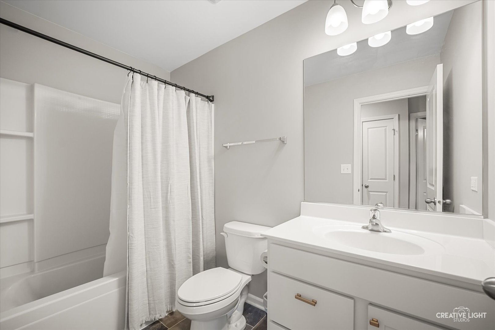 2352 Alison Avenue Pingree Grove, IL 60140 - Photo 15 of 17 a bathroom with a sink a toilet and a mirror
