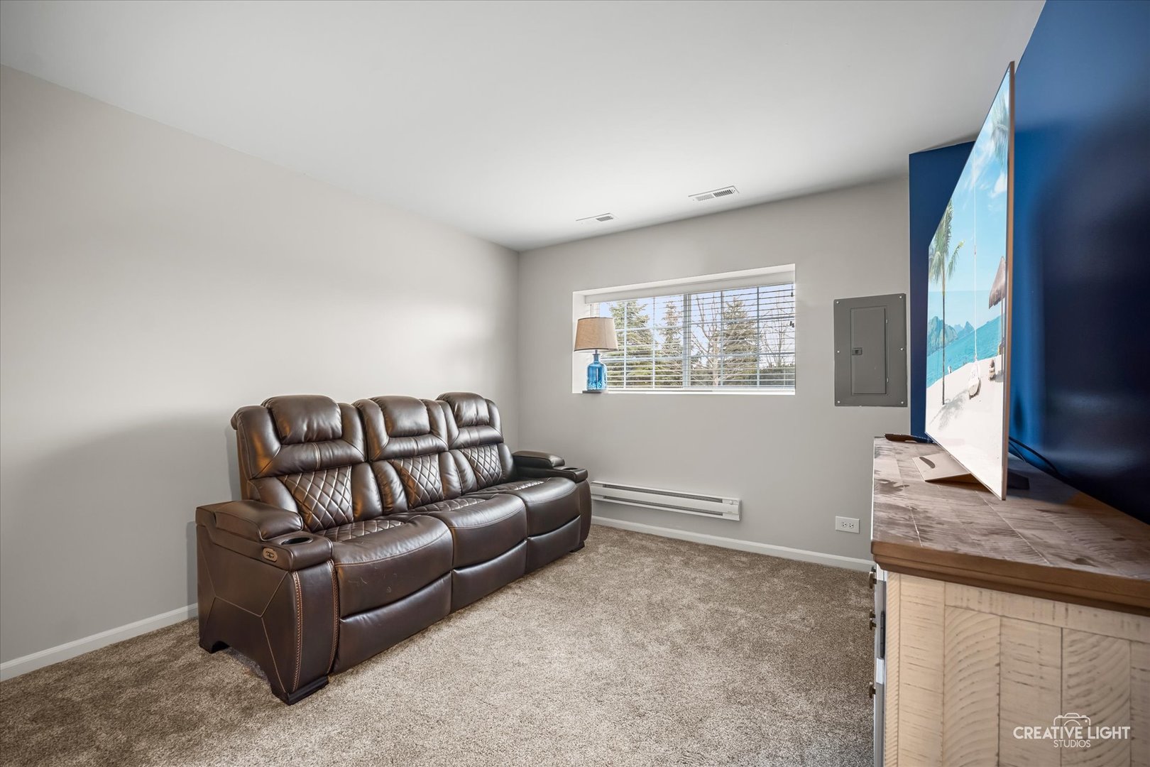 2352 Alison Avenue Pingree Grove, IL 60140 - Photo 8 of 17 a living room with furniture and a flat screen tv