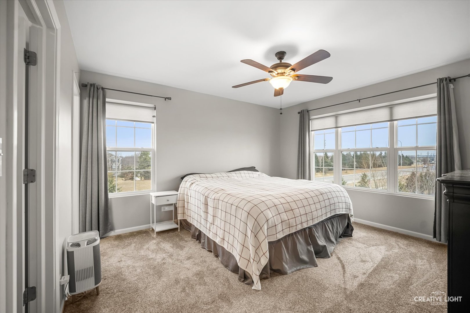 2352 Alison Avenue Pingree Grove, IL 60140 - Photo 10 of 17 a spacious bedroom with a bed and a large window
