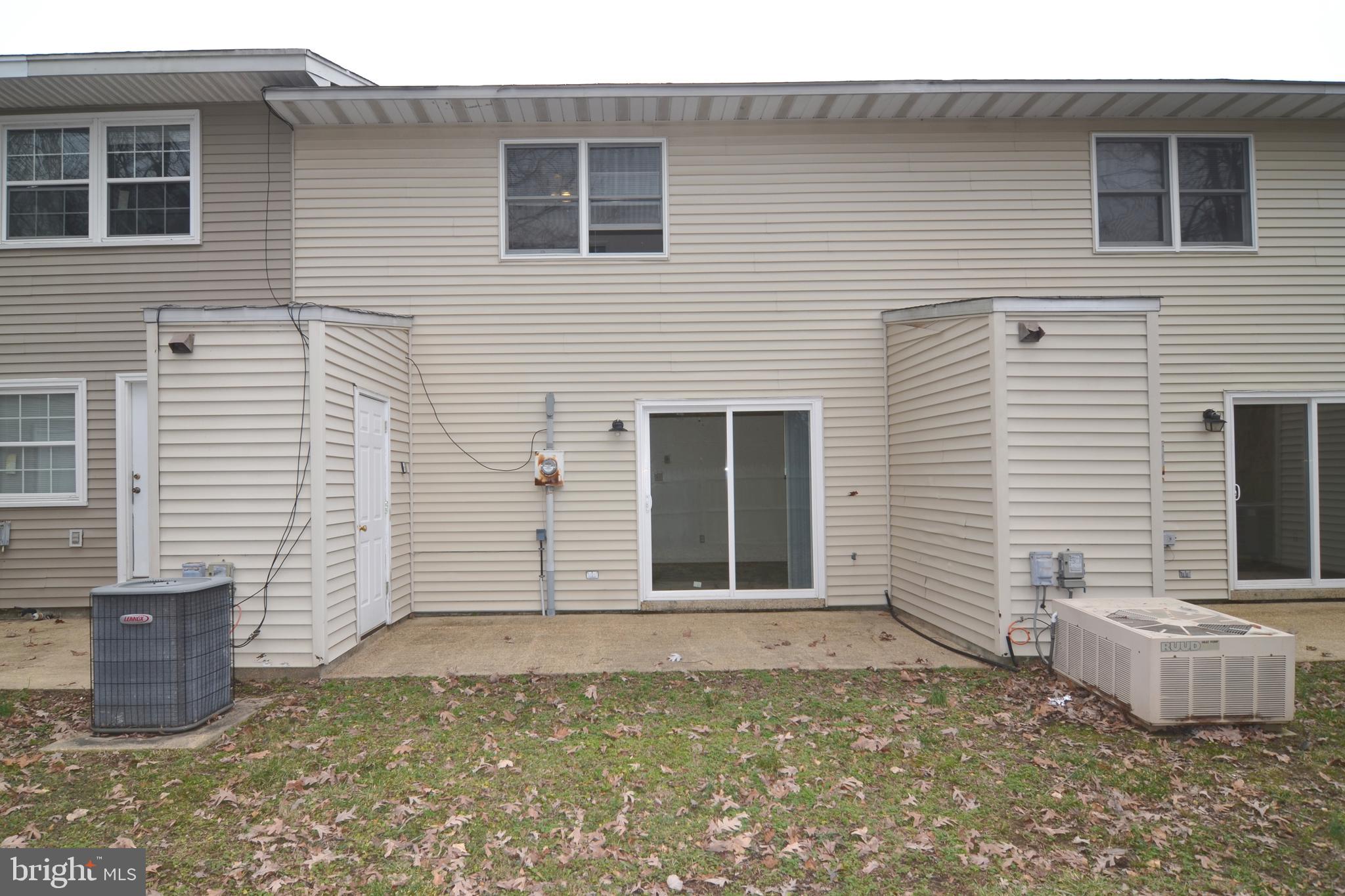 22093 Spring Valley Drive Lexington Park, MD 20653 - Photo 16 of 16 a view of a house with backyard