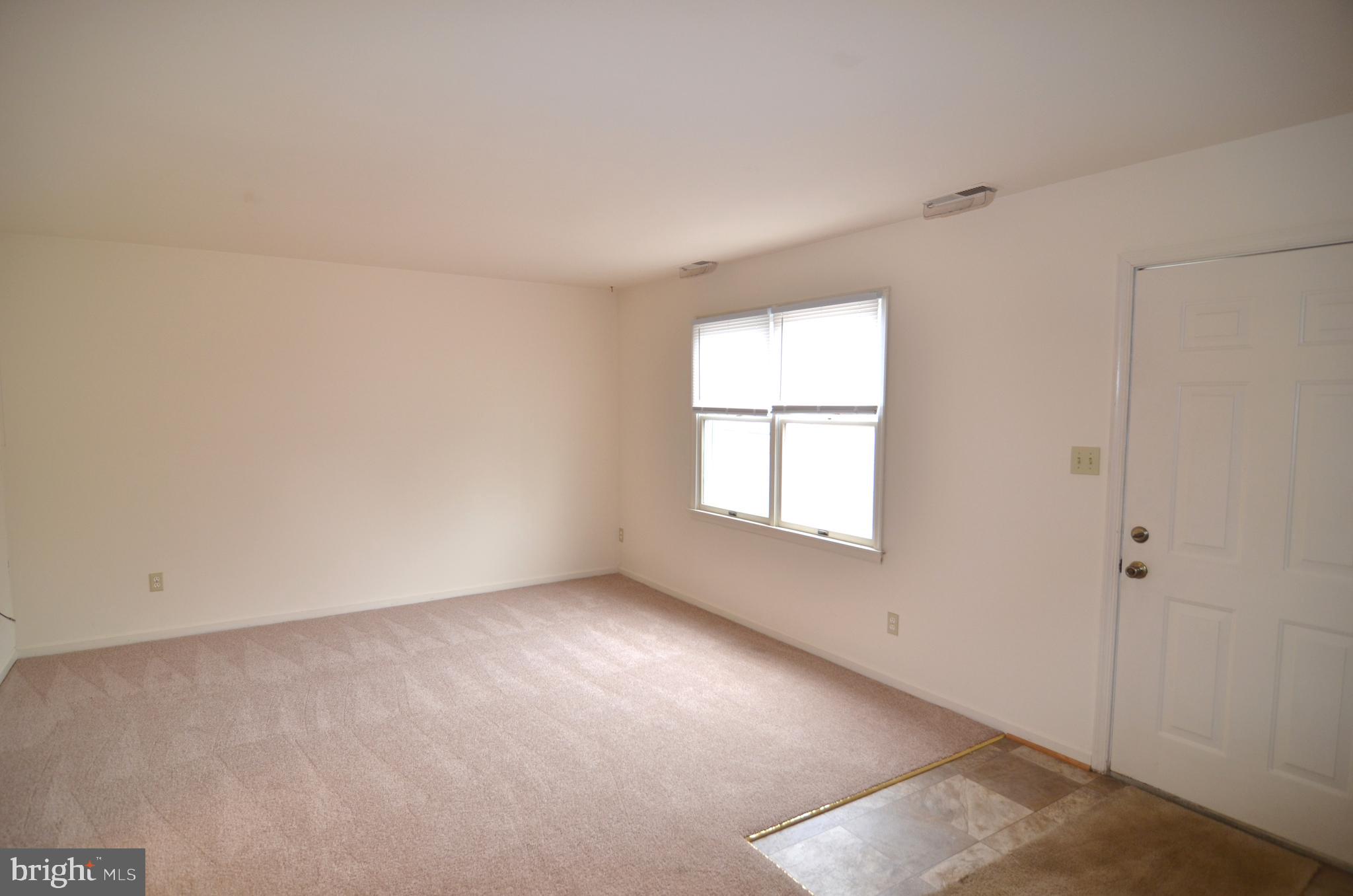 22093 Spring Valley Drive Lexington Park, MD 20653 - Photo 2 of 16 an empty room with a window