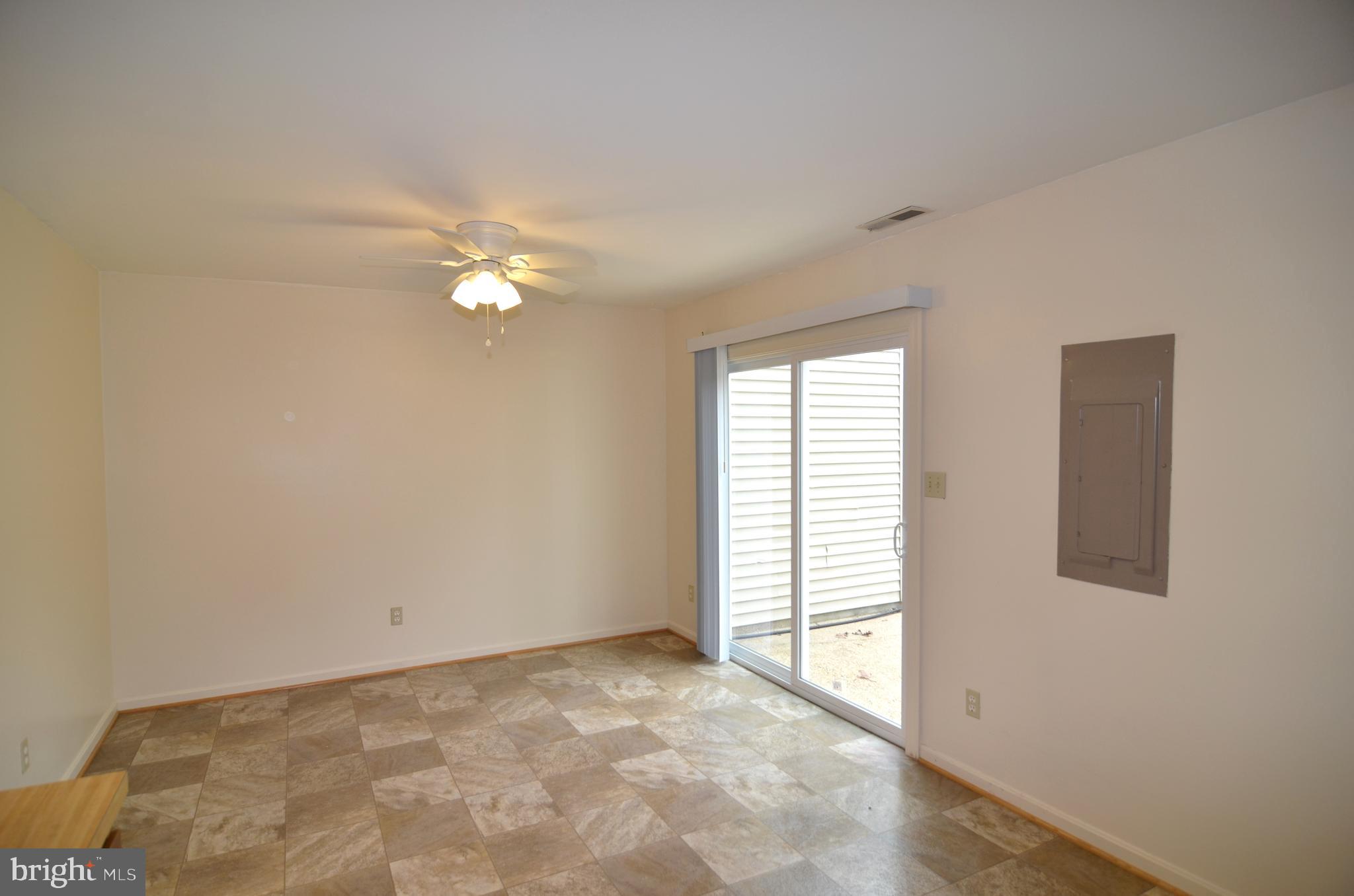 22093 Spring Valley Drive Lexington Park, MD 20653 - Photo 5 of 16 a view of an empty room with a window