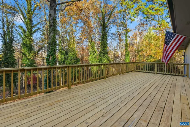 a view of a kitchen with a sink and a stove top oven