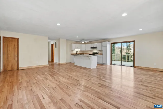 a kitchen with cabinets appliances and a sink