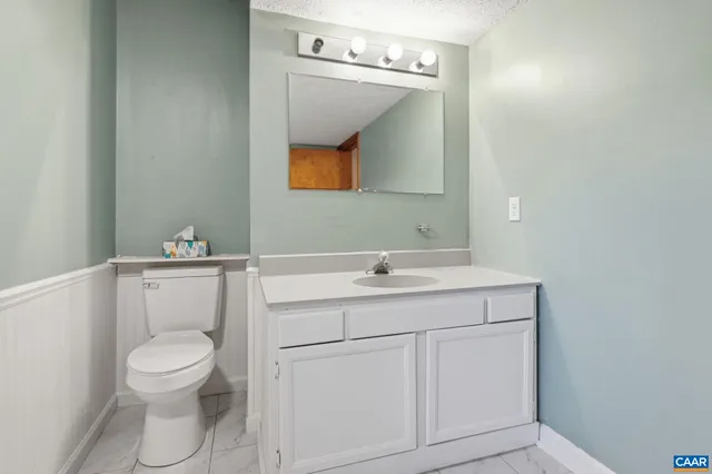 a view of a tree in a yard