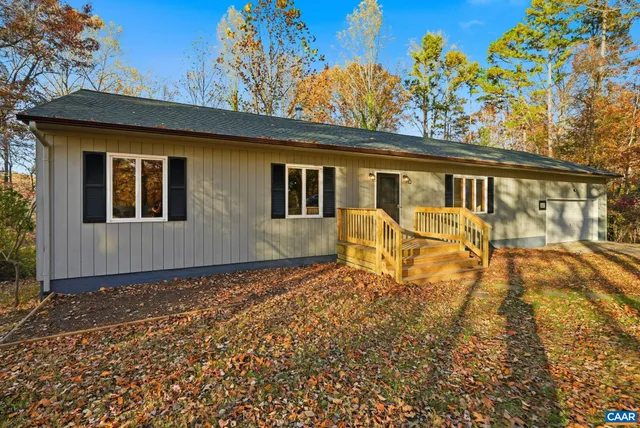a view of backyard with green space
