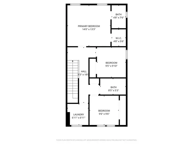 a picture of a bench in front of a wall