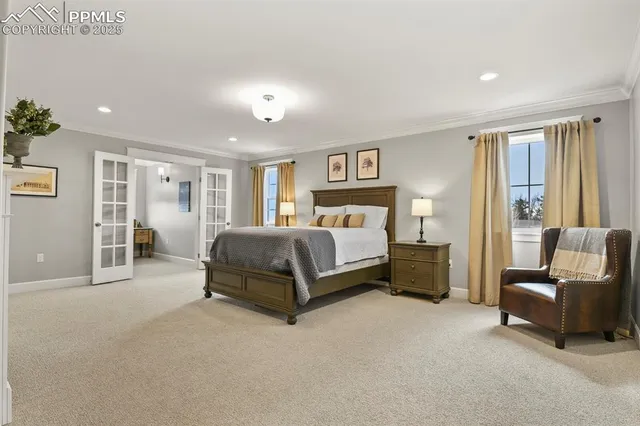 a bedroom with a bed and a couch