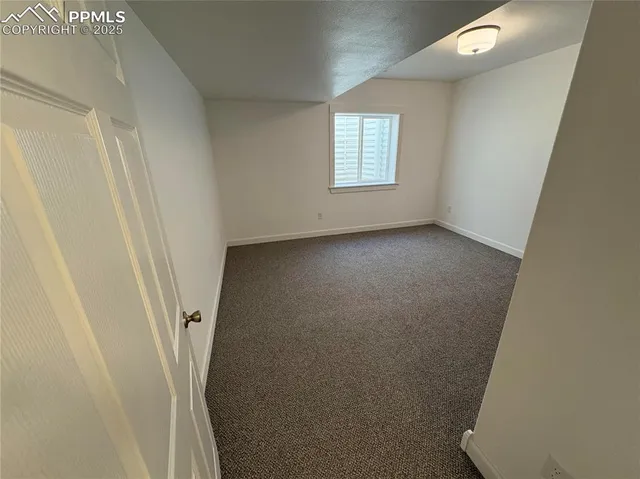 a view of a room with windows