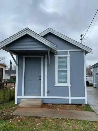 a bathroom with a sink a toilet and a shower