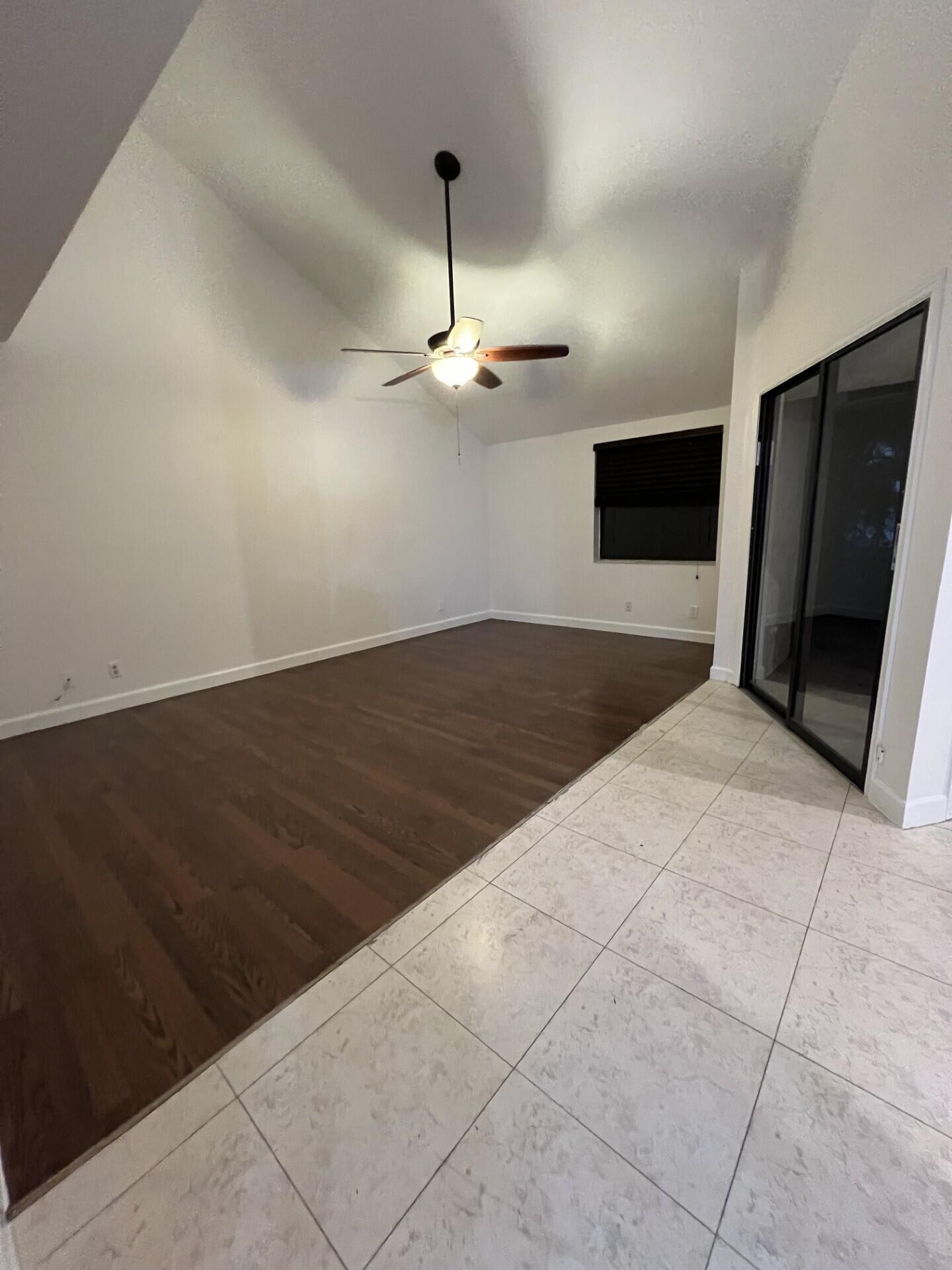 9314 Ketay Circle Boca Raton, FL 33428 - Photo 10 of 22 a view of an empty room with a fireplace