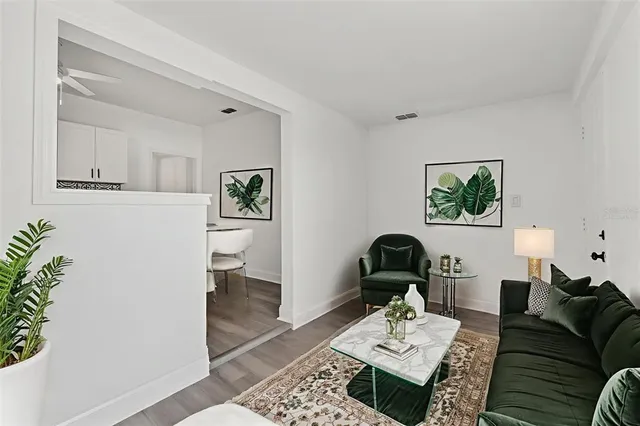 a bedroom with a large bed and a large window