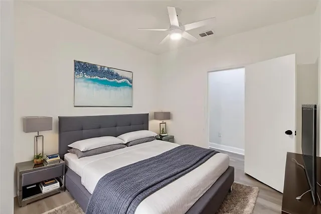 front view of a house with a tree