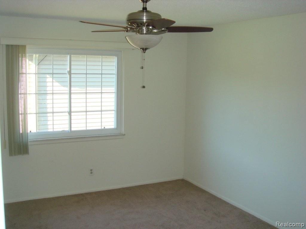 8190 24 Mile Road, Unit 29 Utica, MI 48316 - Photo 3 of 10 Bedroom 2