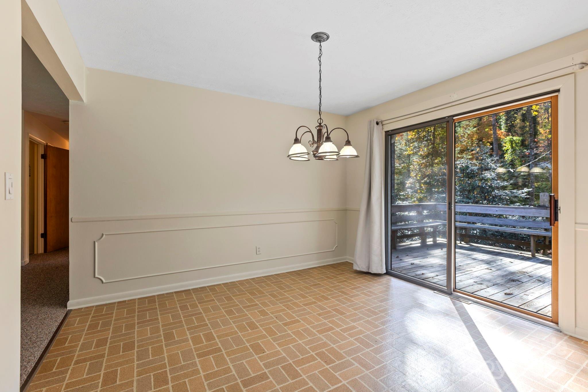 109 Rusty Lane Hendersonville, NC 28791 - Photo 16 of 34 a view of a room with a large window