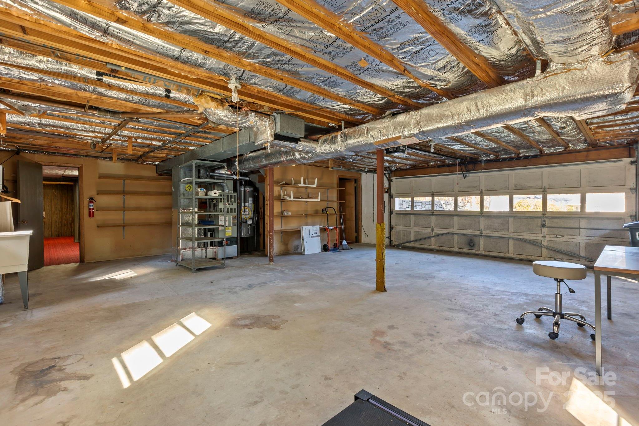 109 Rusty Lane Hendersonville, NC 28791 - Photo 26 of 34 a view of a ceiling room with gym equipment