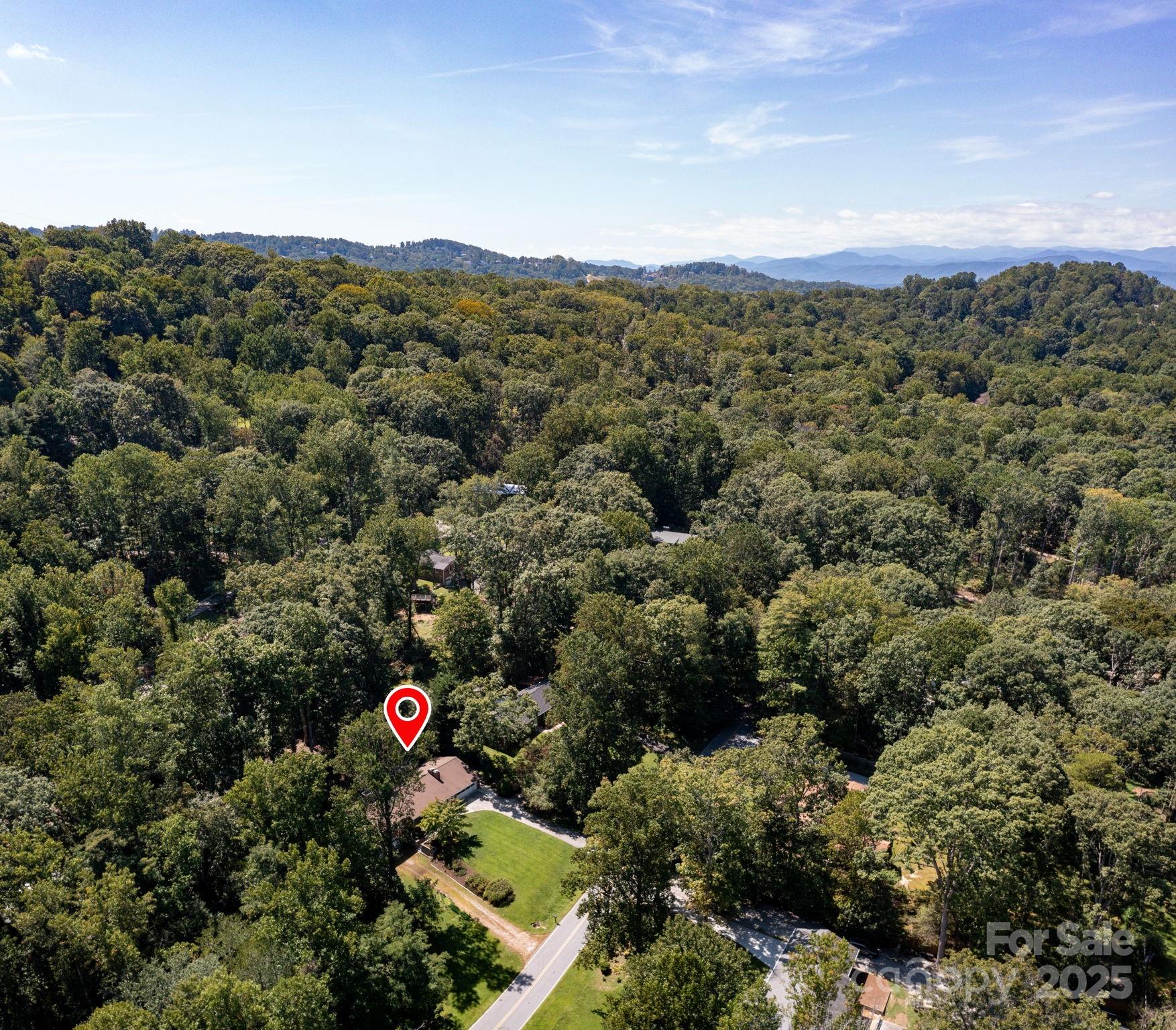 109 Rusty Lane Hendersonville, NC 28791 - Photo 33 of 34 a view of a and covered mountains