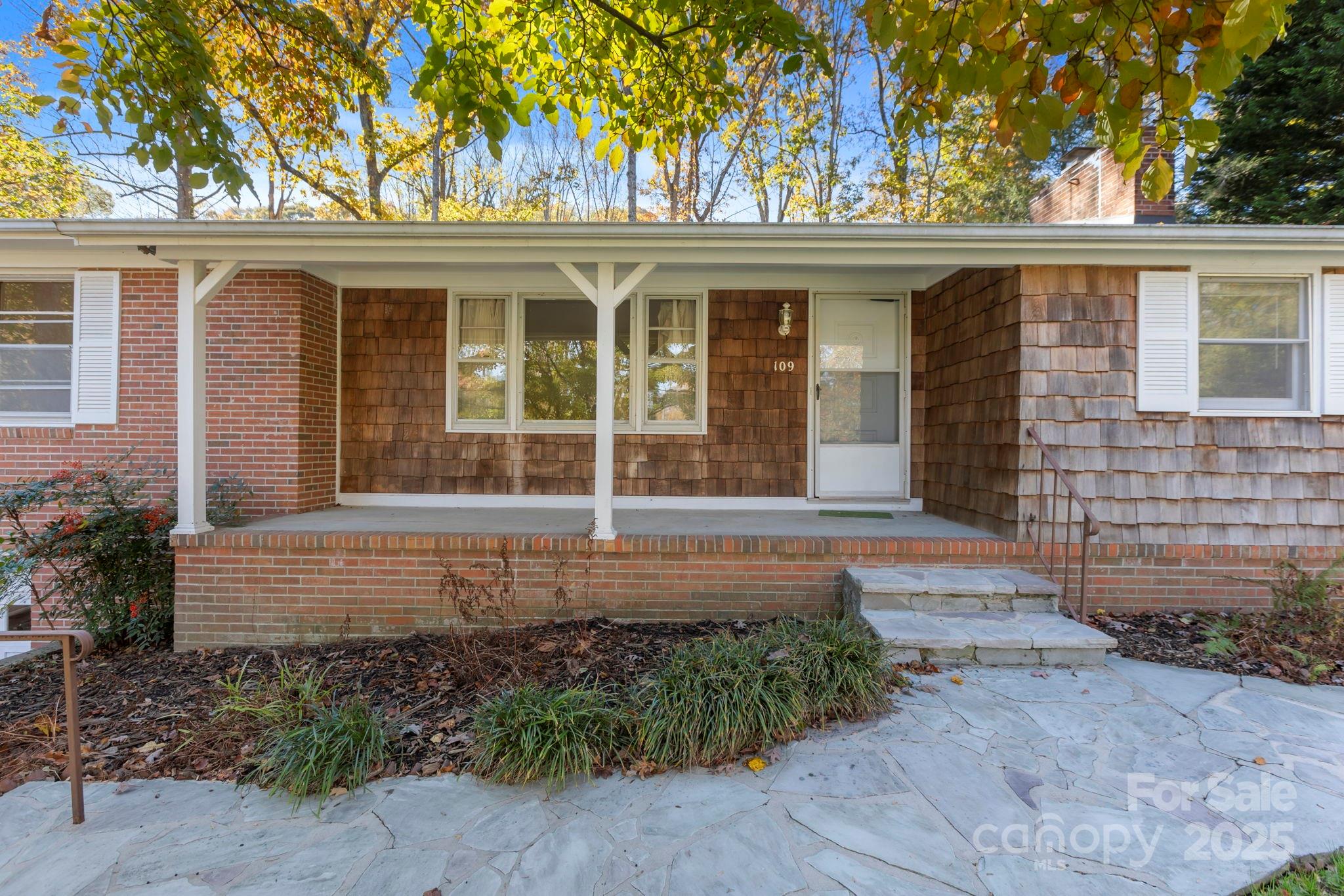 109 Rusty Lane Hendersonville, NC 28791 - Photo 6 of 34 front view of a house