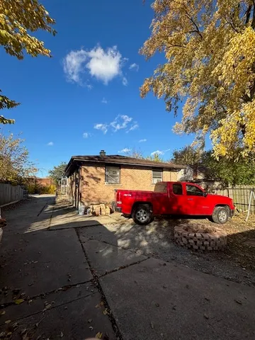 $147,000 | 106 West 157th Street, Harvey, IL 60426