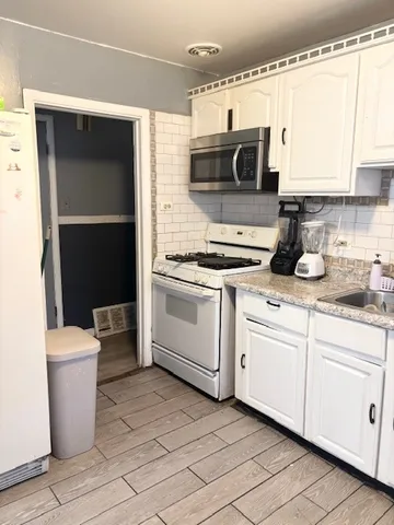 $147,000 | 106 West 157th Street, Harvey, IL 60426