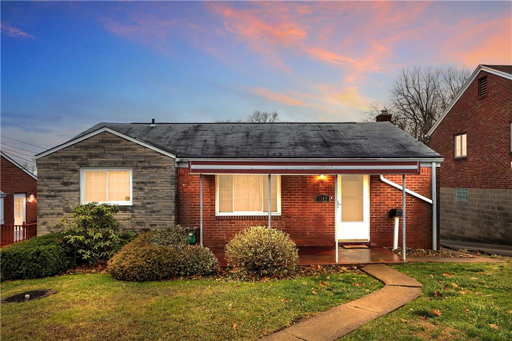 3512 Willett Road Pittsburgh, PA 15227 - Photo 1 of 23 a front view of a house with garden