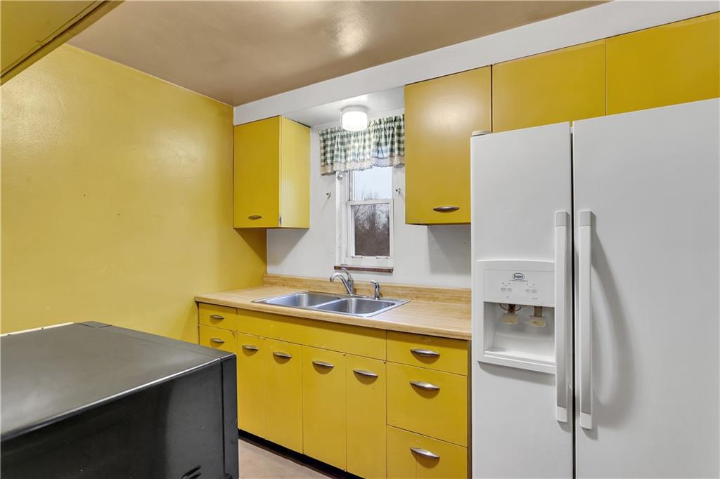 3512 Willett Road Pittsburgh, PA 15227 - Photo 12 of 23 a bathroom with a sink and a mirror