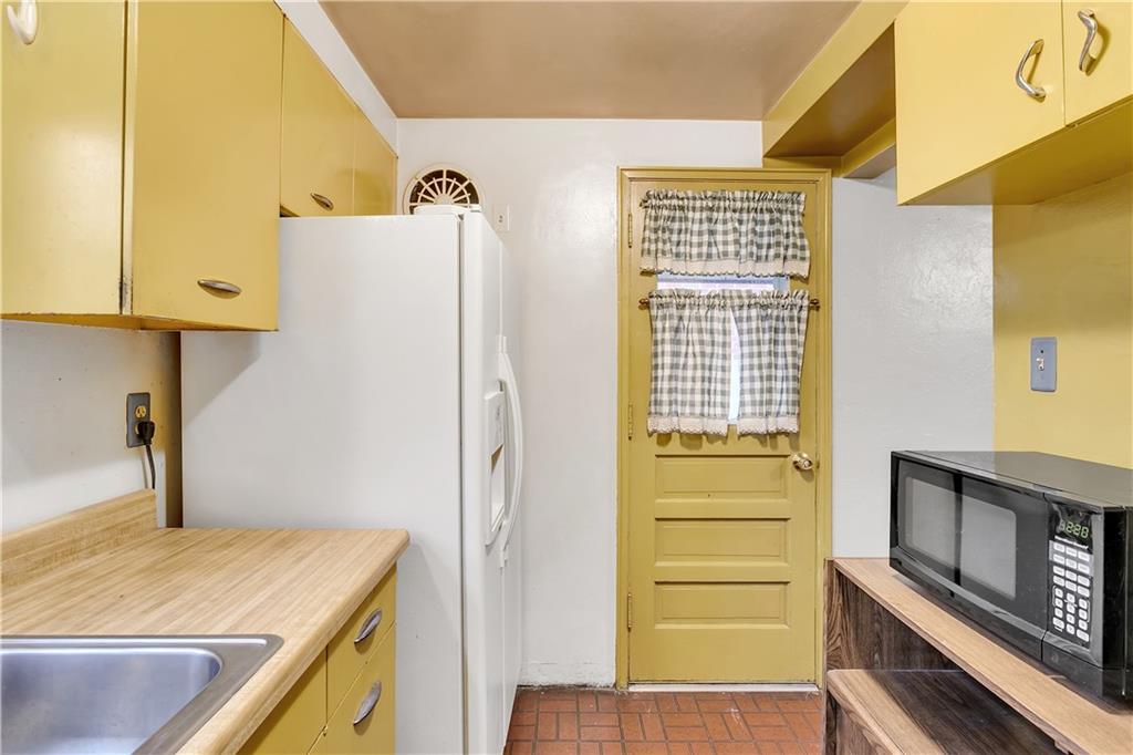 3512 Willett Road Pittsburgh, PA 15227 - Photo 14 of 23 a view of kitchen and utility room