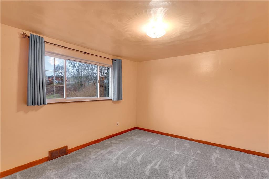 3512 Willett Road Pittsburgh, PA 15227 - Photo 18 of 23 a view of an empty room with a window