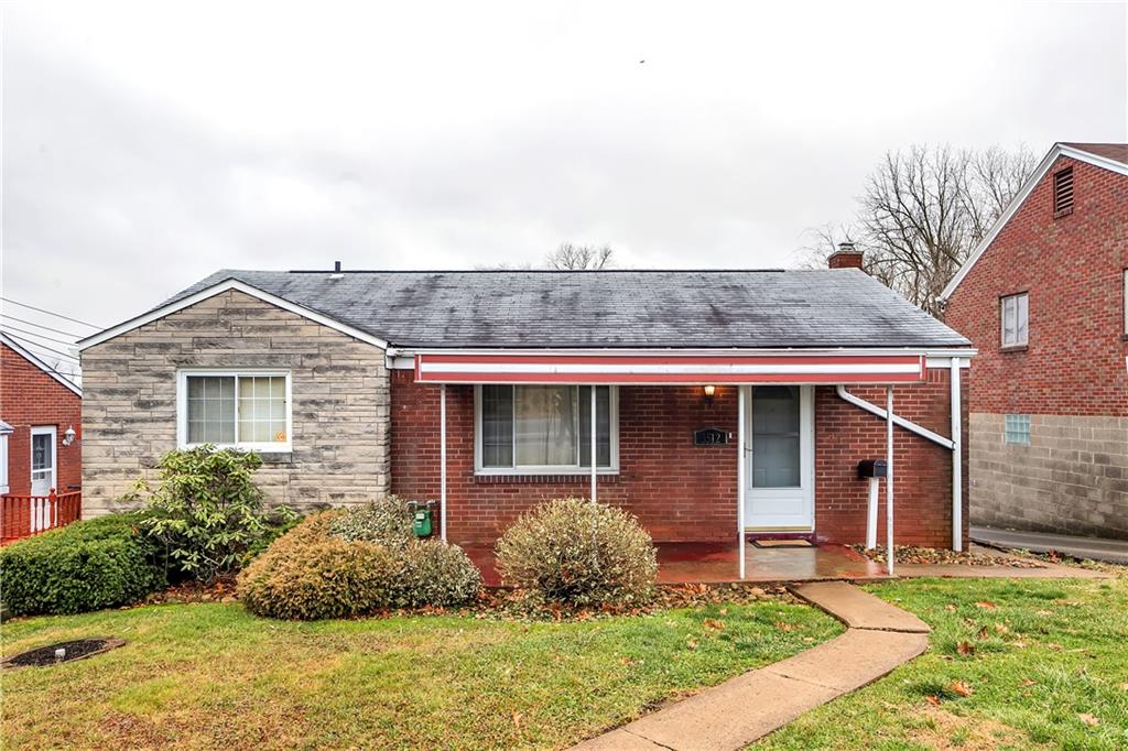 3512 Willett Road Pittsburgh, PA 15227 - Photo 2 of 23 front view of a house with a yard