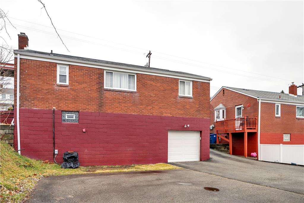 3512 Willett Road Pittsburgh, PA 15227 - Photo 5 of 23 a front view of a house with a yard
