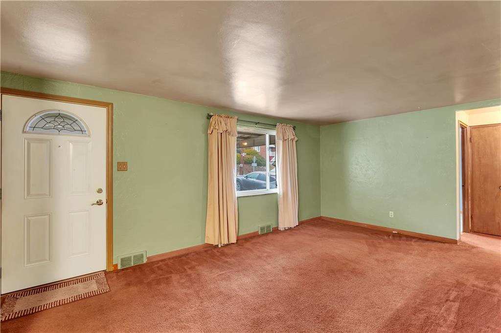 3512 Willett Road Pittsburgh, PA 15227 - Photo 8 of 23 an empty room with entrance and windows