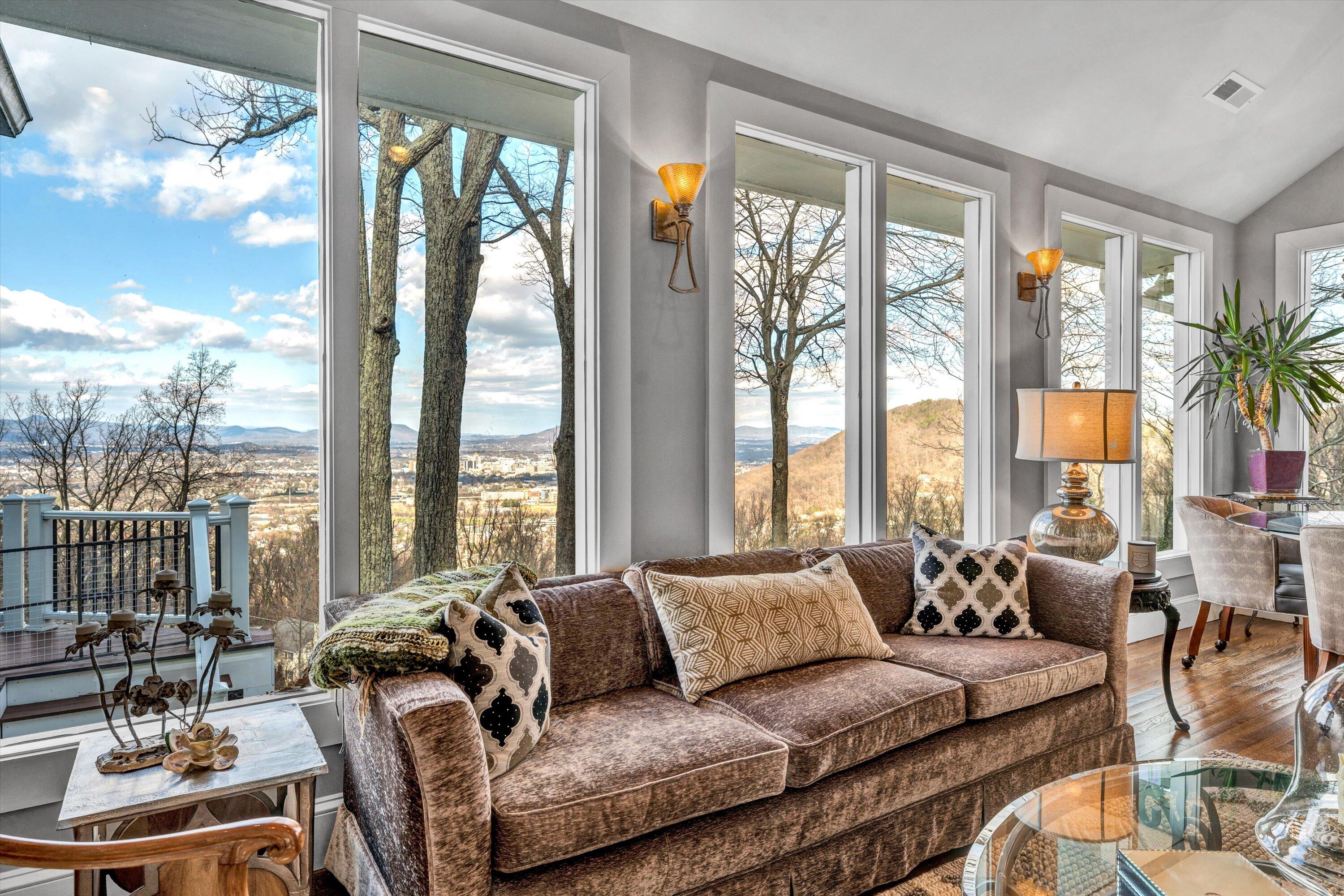 3028 Lockridge Road Southwest Roanoke, VA 24014 - Photo 12 of 51 a living room with furniture and floor to ceiling windows