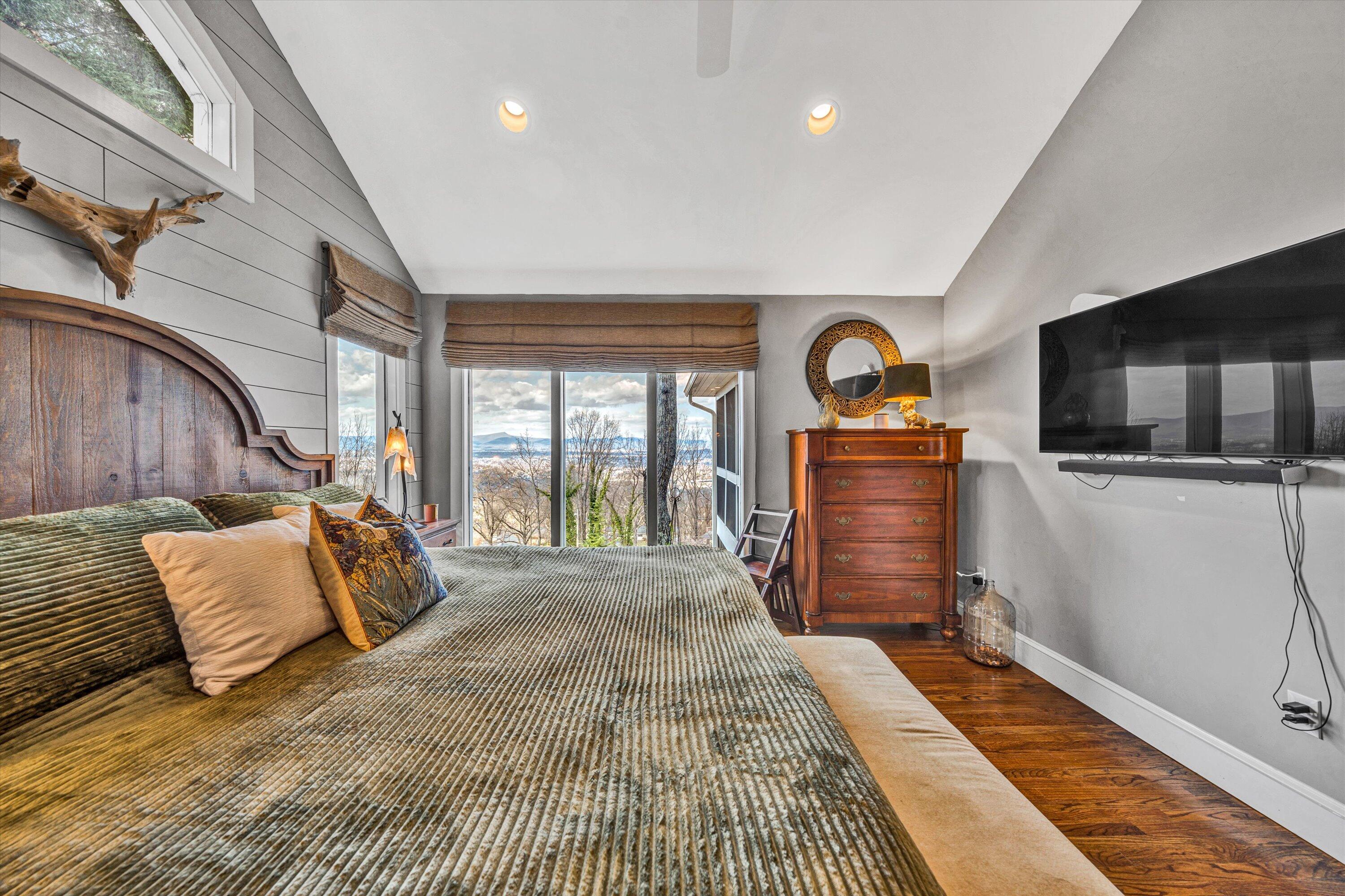 3028 Lockridge Road Southwest Roanoke, VA 24014 - Photo 29 of 51 a bedroom with a bed and wooden floor