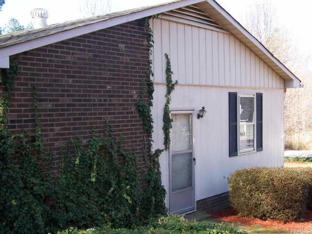 424 Reade Drive Roxboro, NC 27573 - Photo 6 of 10 Side entrance of home leading to office or exercise room