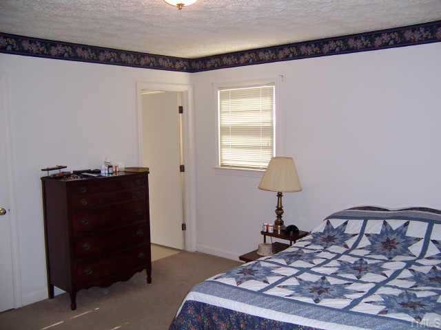 424 Reade Drive Roxboro, NC 27573 - Photo 9 of 10 master bedroom