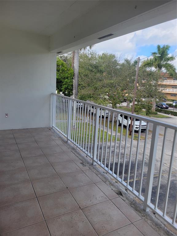 600 South Luna Court, Unit 29 Hollywood, FL 33021 - Photo 11 of 13 a balcony with outdoor space