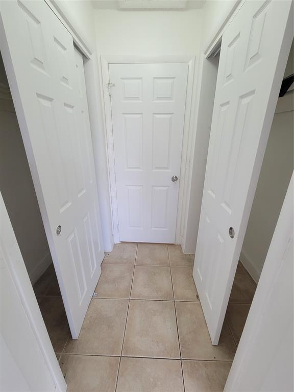 600 South Luna Court, Unit 29 Hollywood, FL 33021 - Photo 7 of 13 a view of a hallway to rooms