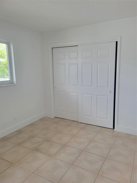 600 South Luna Court, Unit 29 Hollywood, FL 33021 - Photo 8 of 13 a view of an empty room with a window