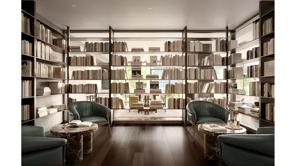 a living room with furniture and a floor to ceiling window