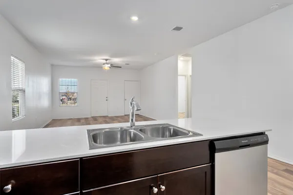 a utility room with washing machine