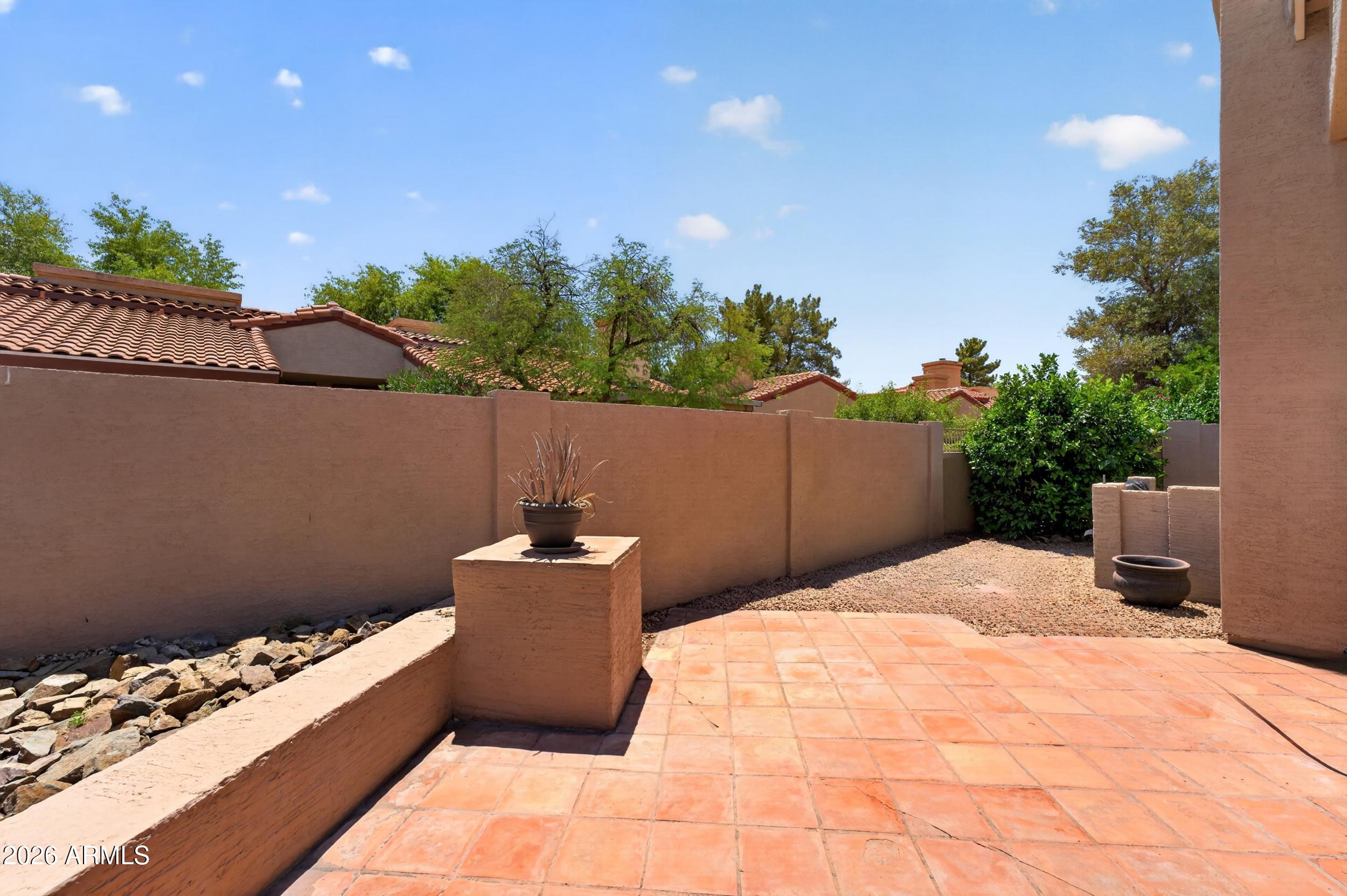 4729 West Monterey Street Chandler, AZ 85226 - Photo 34 of 50 a balcony with table and chairs