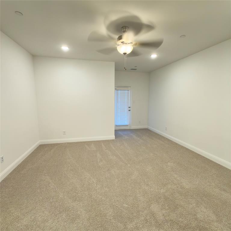 2541 Brunswick Way Allen, TX 75013 - Photo 13 of 20 a view of an empty room with a chandelier fan