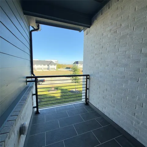 a bathroom with a double vanity sink and mirror